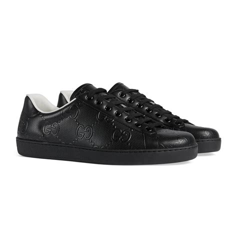 men's black gucci sneakers|black embossed gucci men sneaker.